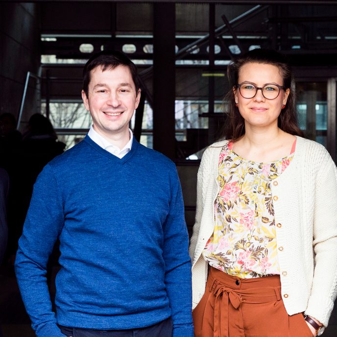 Portrait of the four participants in the table conversation.