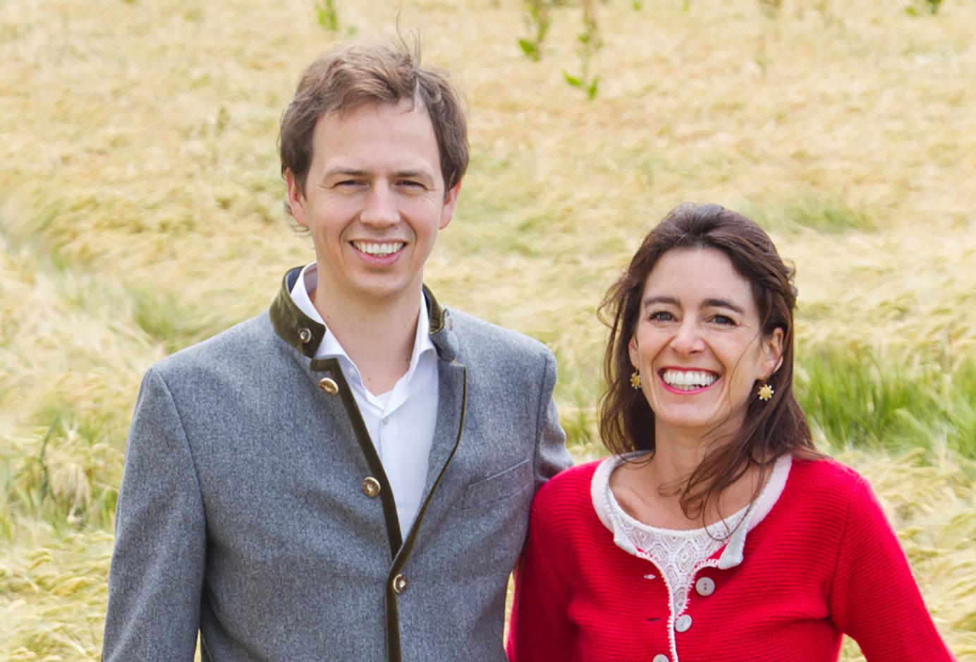 Thomas Maier-Eschenloher and his wife are standing in a cornfield.