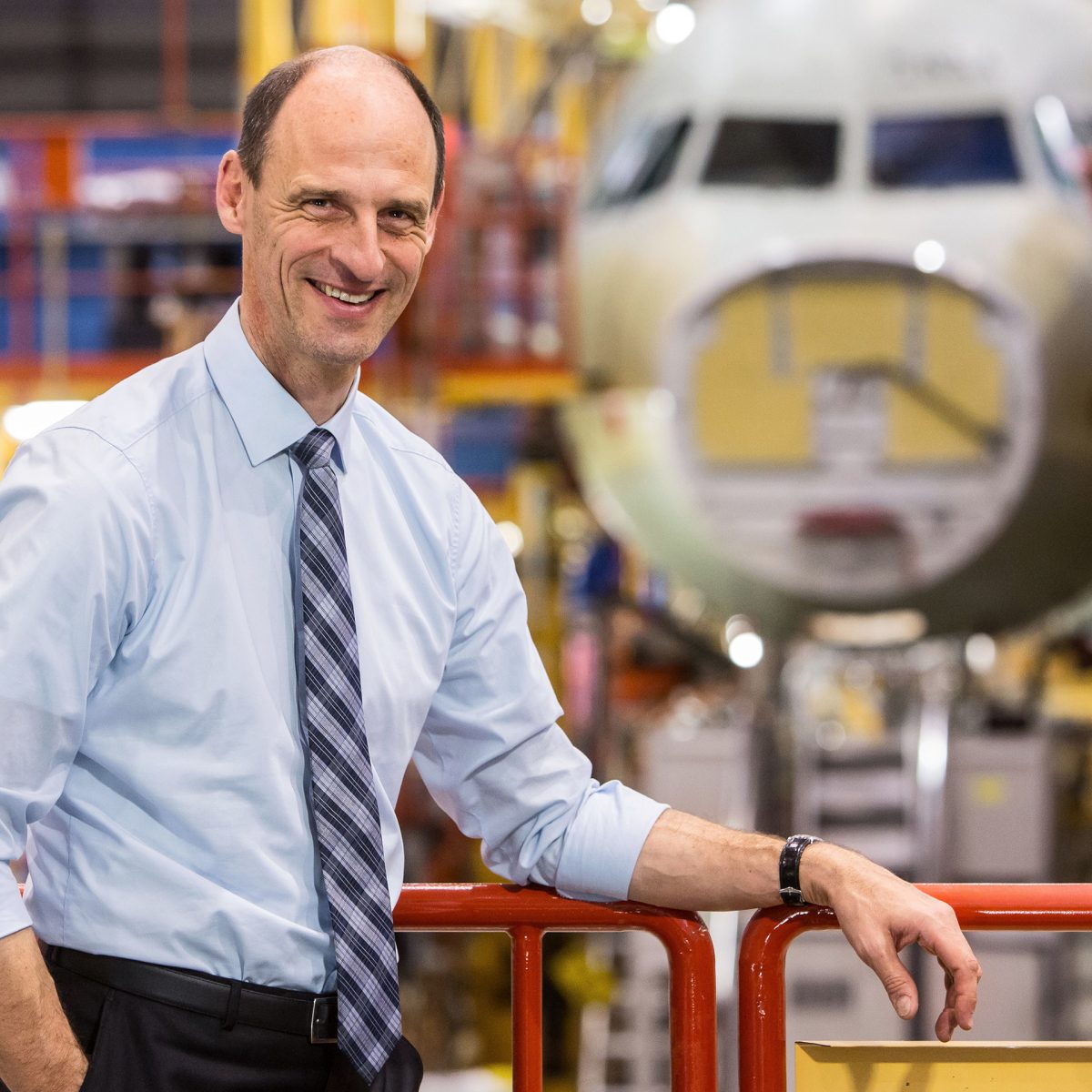 TUM Alumni Klaus Richter at Airbus' final assembly line in Hamburg.