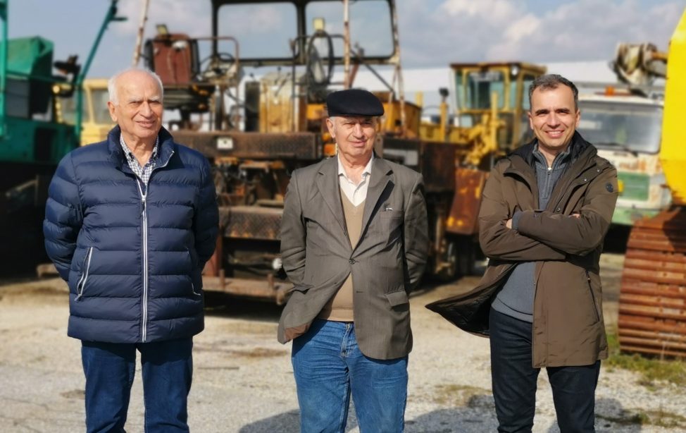 TUM Alumni Georgios Piatidis, Athanasios Piatidis and Alexandros Piatidis (from left to right) with their fleet of construction machinery.