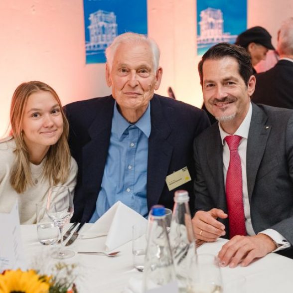 Diamond Jubilarian Dr. Herbert Deuschl with his granddaughter and President Thomas Hofmann at the President's Alumni Dinner.