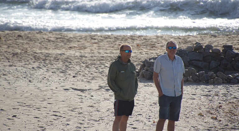 Stefan Burdach and Poul Sorensen on the beach in Denmark.