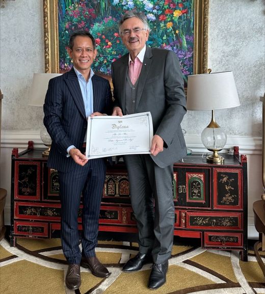 Thai-Lai Pham with Wolfgang A. Herrmann.